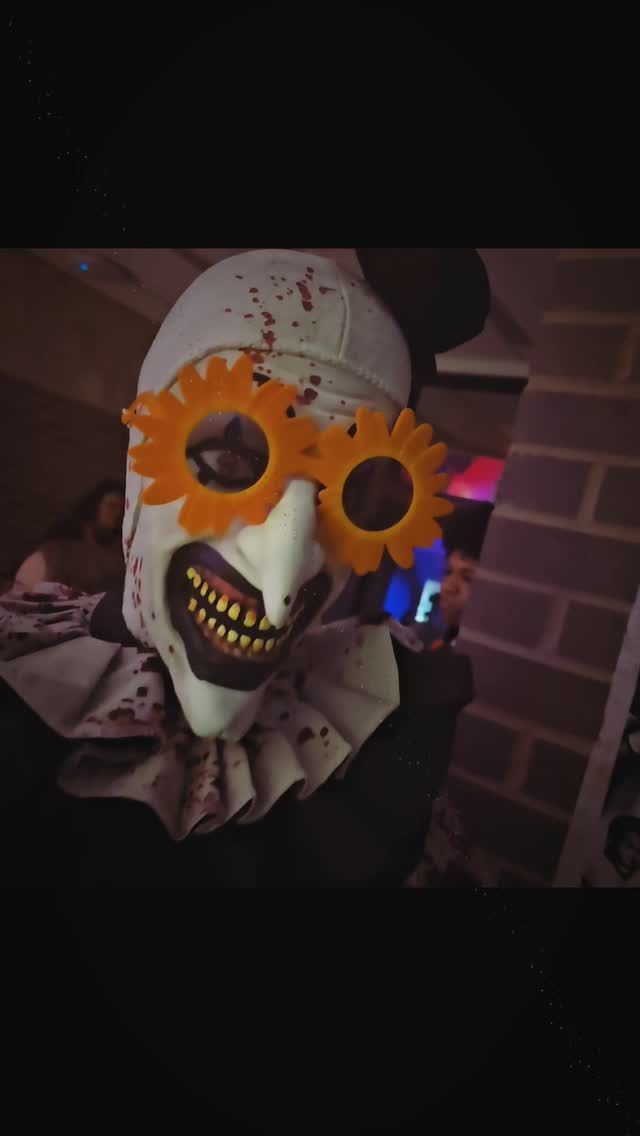 A creepy Halloween mask in the dark